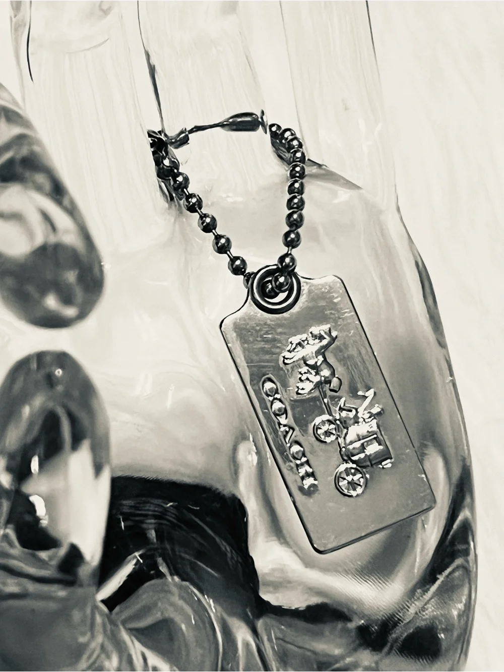Coach Silver Tone Embossed Horse & Carriage Dog Tag Keychain